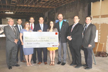 Wells Fargo makes $112,500 check presentation to downtown Hazleton Launchbox project